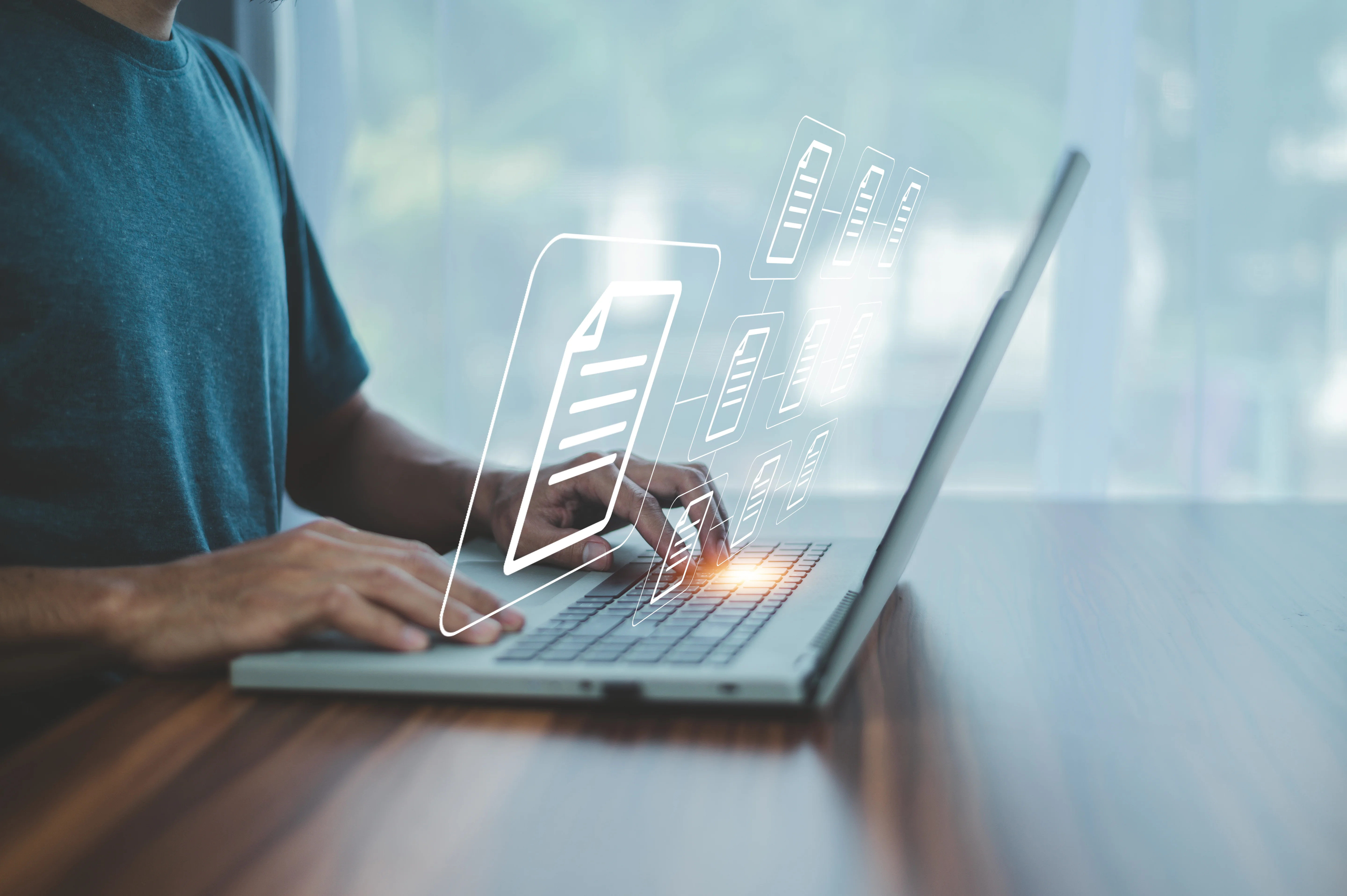 A business person using a computer Document Management System (DMS) to efficiently manage files.